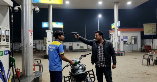 Man points pistol at Dalit petrol pump employee fills free petrol - AI Image